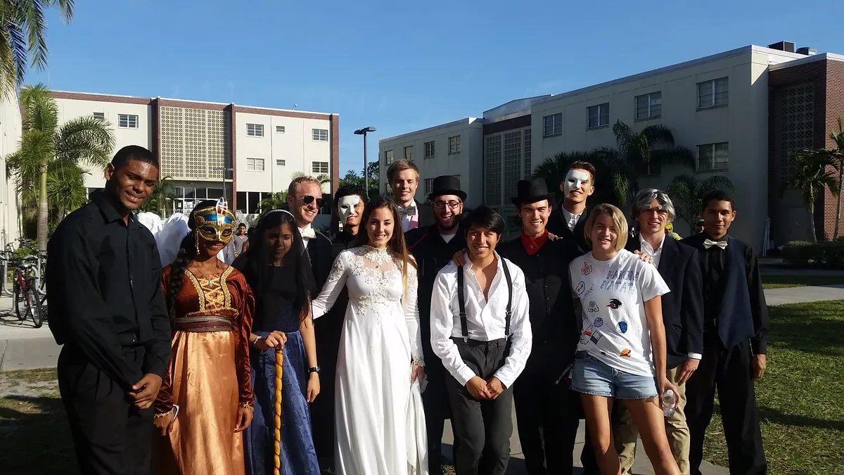 Treat-or-Treat volunteers all dressed up in a variety of fun costumes.