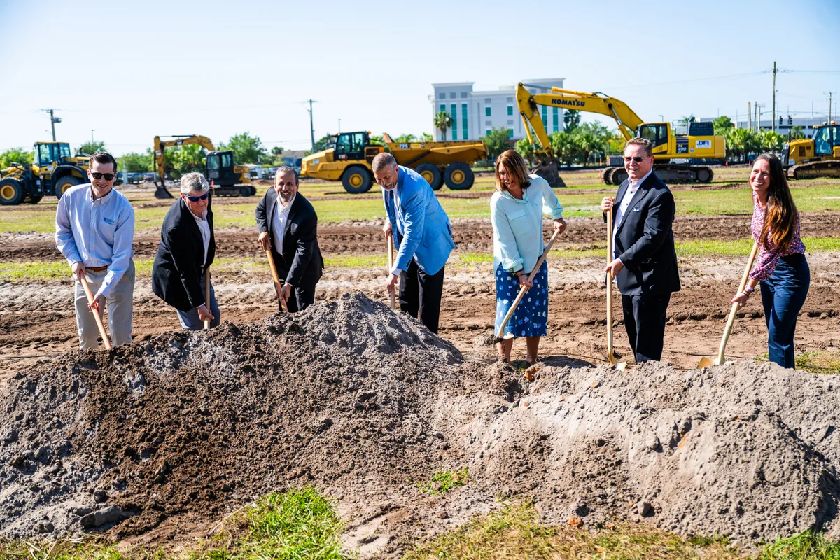 President Nicklow with members of the design and construction teams.