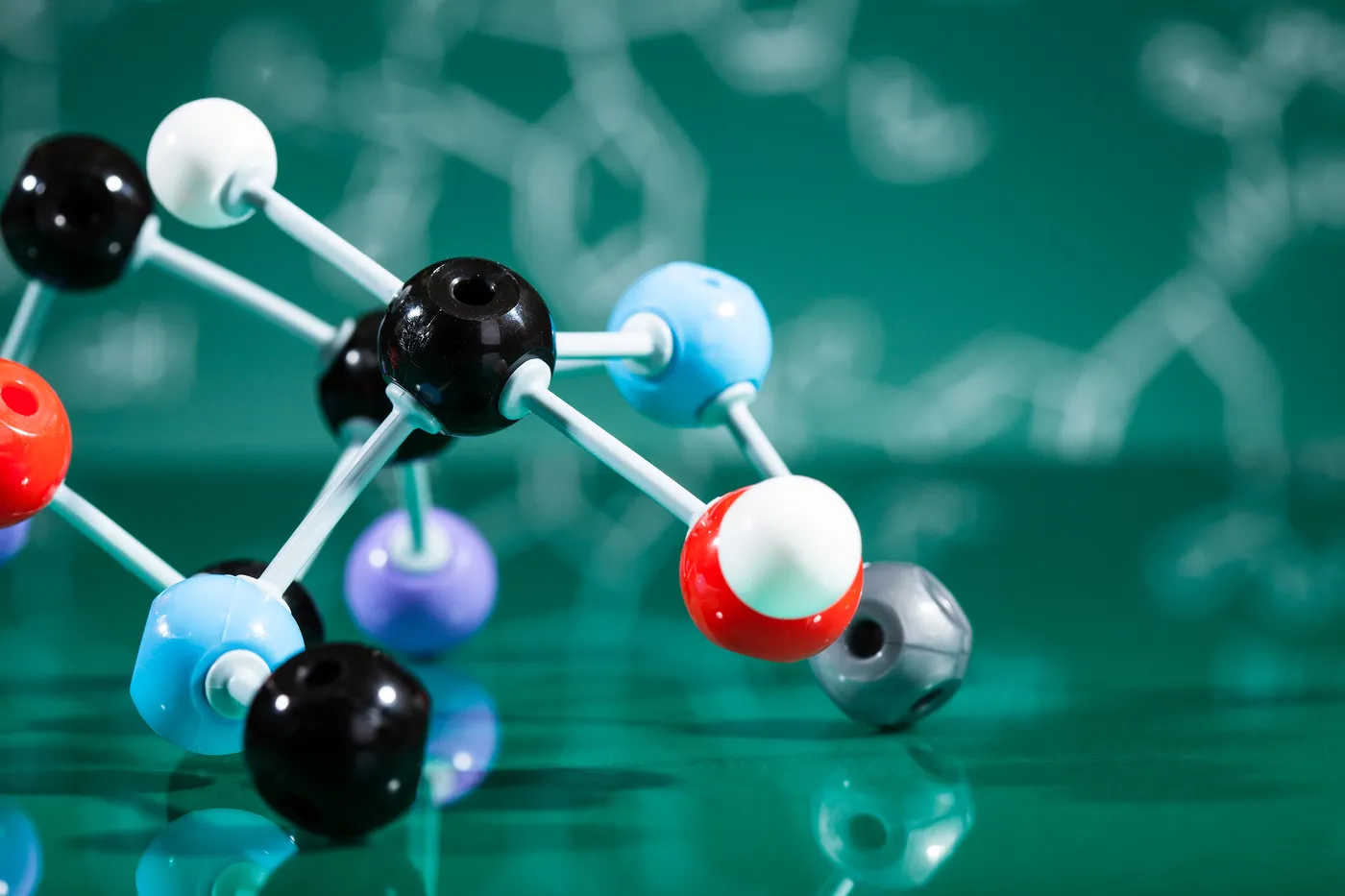 Molecules against green backgroiund