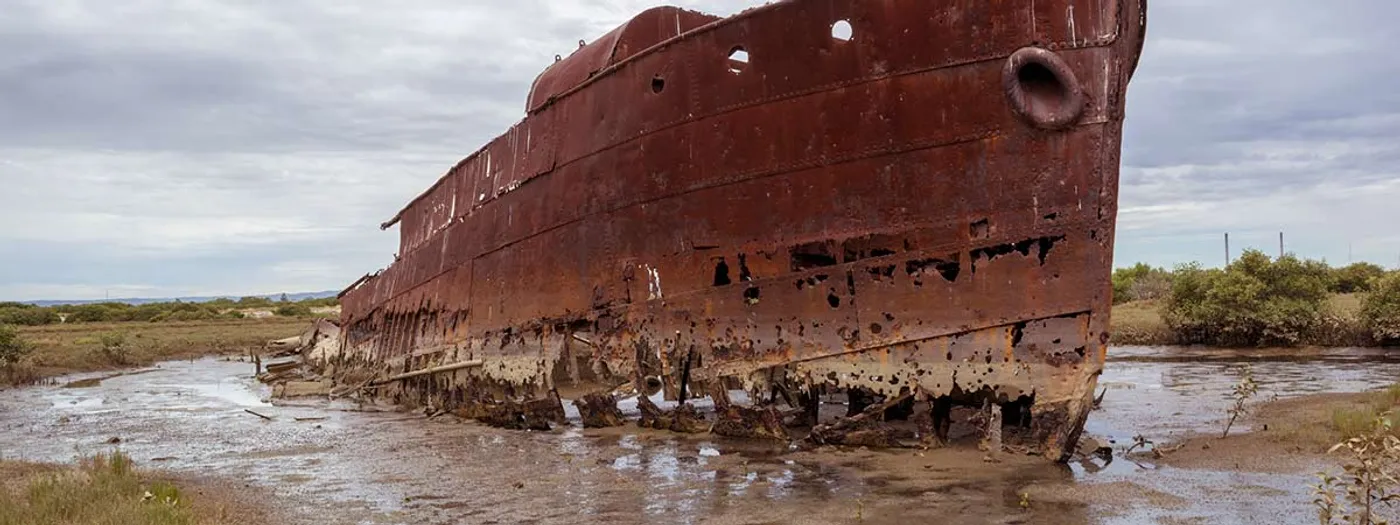 Corroded Boat on the Water