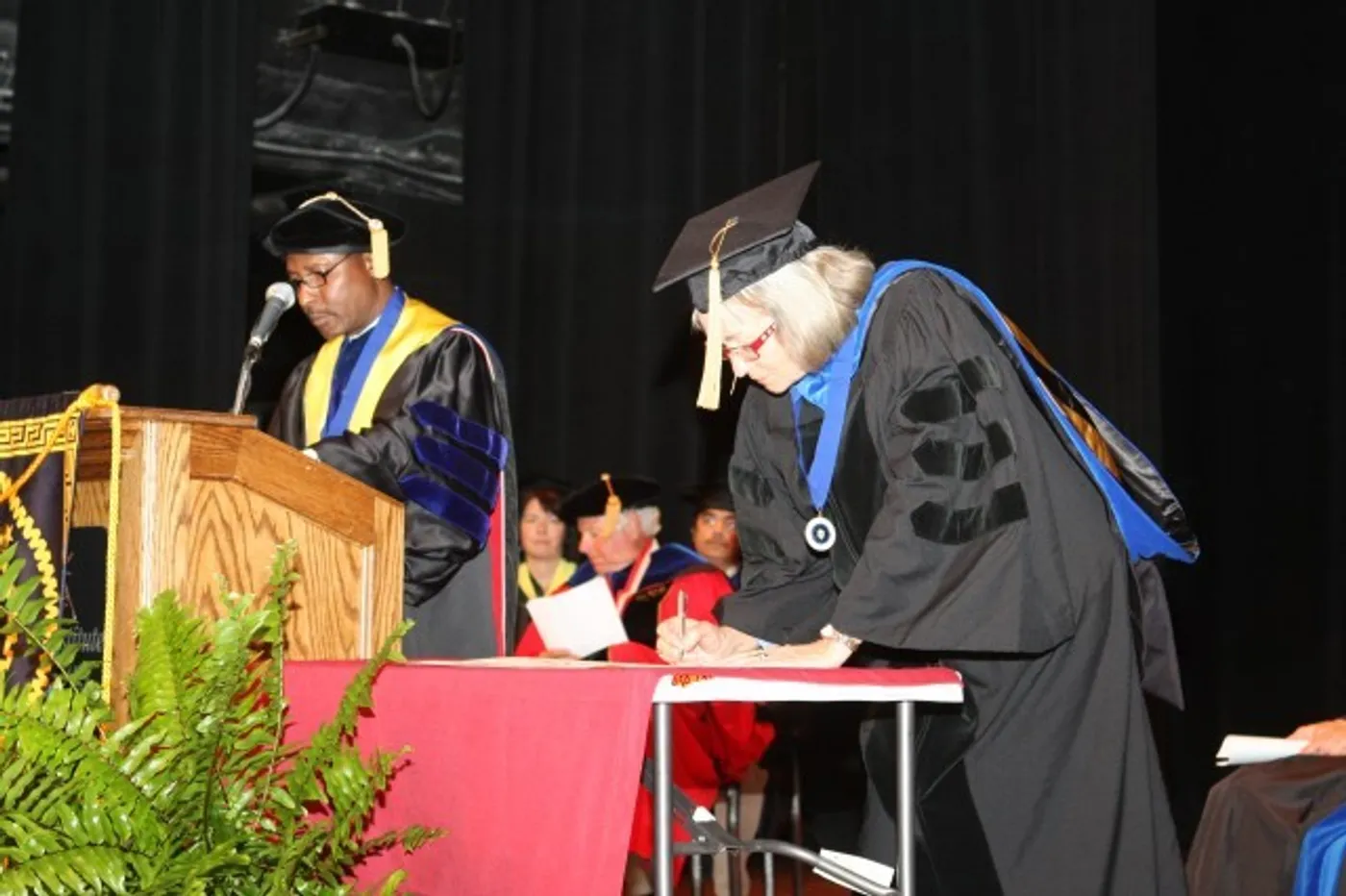 A member signing off on the certificate