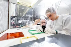 Sarah and Jacqui working in clean room