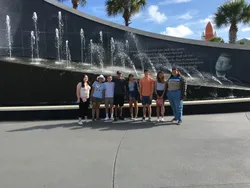 Students in front of JFK fountain at Kennedy Space Center