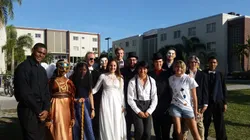 Treat-or-Treat volunteers all dressed up in a variety of fun costumes.
