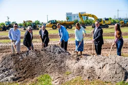 President Nicklow with members of the design and construction teams.