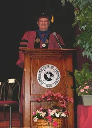 Standing at the podium
